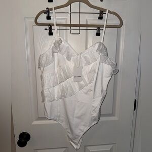 Heyson Women’s White Ruffled Bodysuit